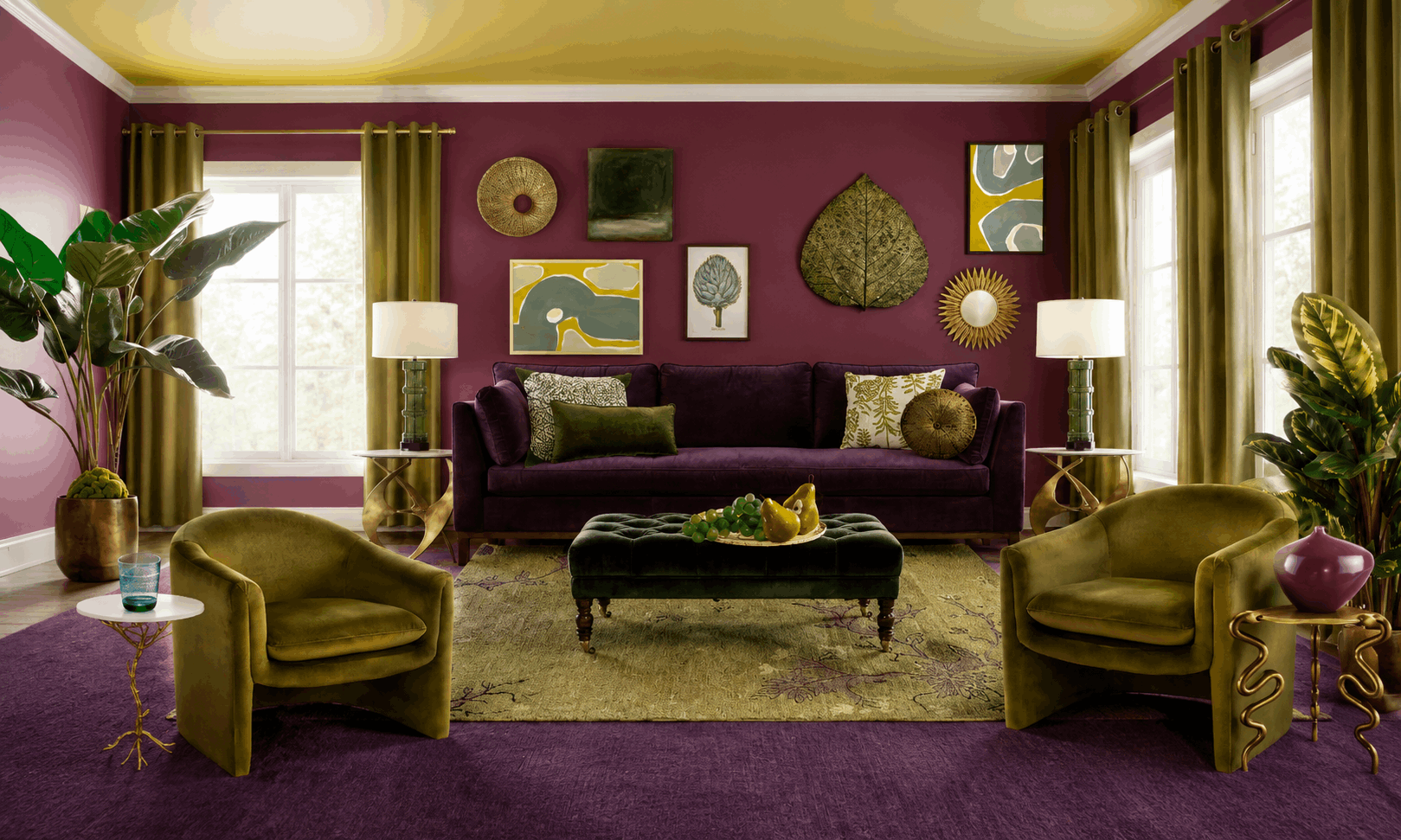 Luxurious living room with a purple velvet sofa, olive chairs, and gold side tables against a magenta wall with assorted wall art.